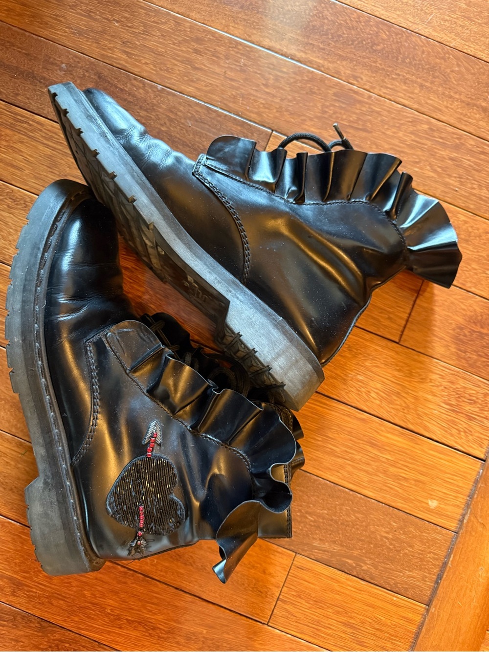 Valentino Garavani Black Ruffle Combat Boots - Stylish Lace-Up Ankle Boot